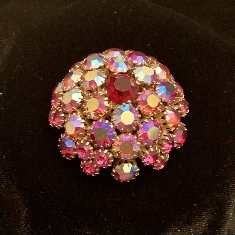 Large dome brooch made from pink aurora borealis rhinestones, signed Warner